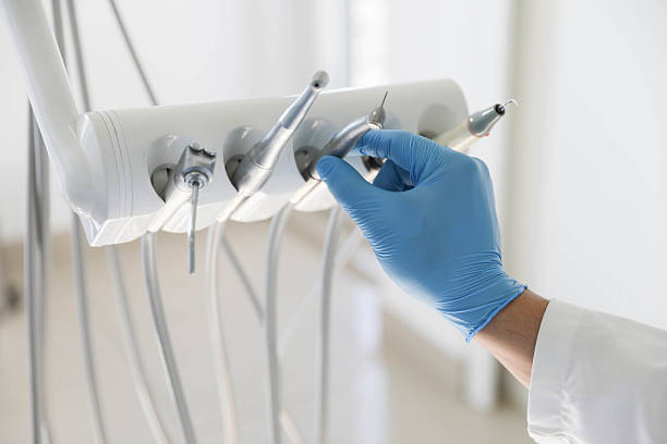 Professional Tooth Extraction technician working in Southaven, MS